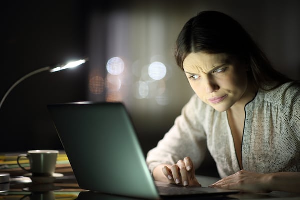 Woman Questioning Computer