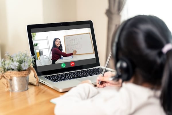 teacher shares whiteboard with student on video call